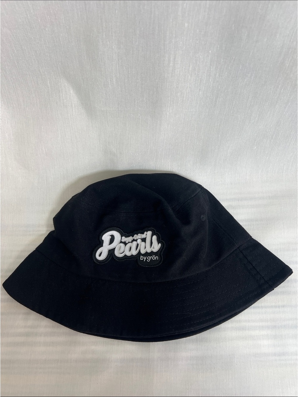 Black Suger-Coated Pearls by grön' Embroidered Bucket Hat